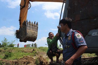 backhoe for demolition in Davao City