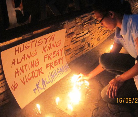 Candle-lighting for the victims at the gates of the Glencore-Xstrata-SMI Office in General Santos City (Photo courtesy of Karapatan Socsksargen)
