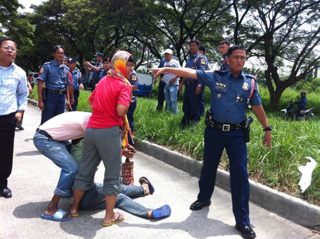 Police arrested 11 members of the fact finding team at 11:40 a.m. Sept. 17 (Photo courtesy of Anakpawis Partylist / Bulatlat.com)