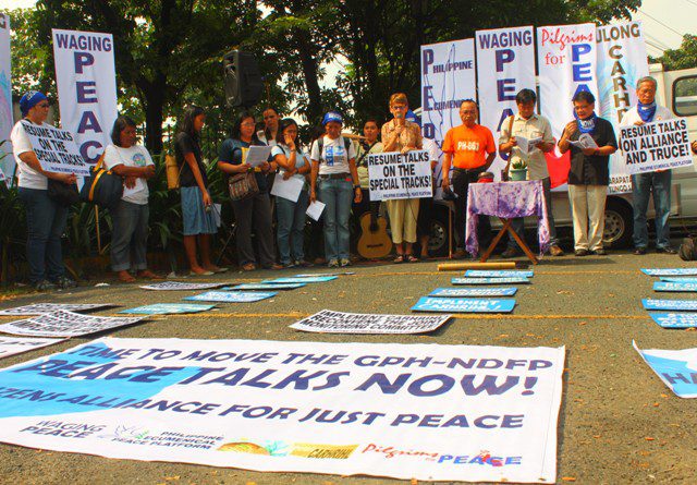 Members of the Citizens Alliance for Just Peace hold an ecumenical prayer at Sto. Domingo Church, Quezon City, Sept. 2, to call for the resumption of peace talks between the Government of the Philippines and the National Democratic Front of the Philippines (NDFP). (Photo by Ronalyn V. Olea/ Bulatlat.com)