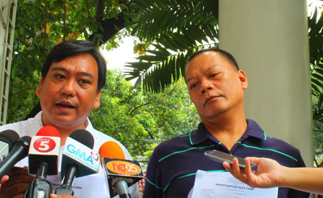 Lawyer Ephraim Cortez (left) explains the charges Rolly Mira Panesa filed against several military and police officers and alleged rebel returnees. (Photo by Ronalyn V. Olea/Bulatlat.com)