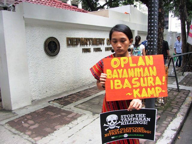 KAMP's Piya Macliing Malayao at the gate of Dept. of Justice shortly before they file an urgent appeal to Justice Sec. de Lima asking for a probe on the prosecutors who dismissed the charges filed by witnesses vs accused soldiers Oct. 18, 2013 (www.bulatlat.com)