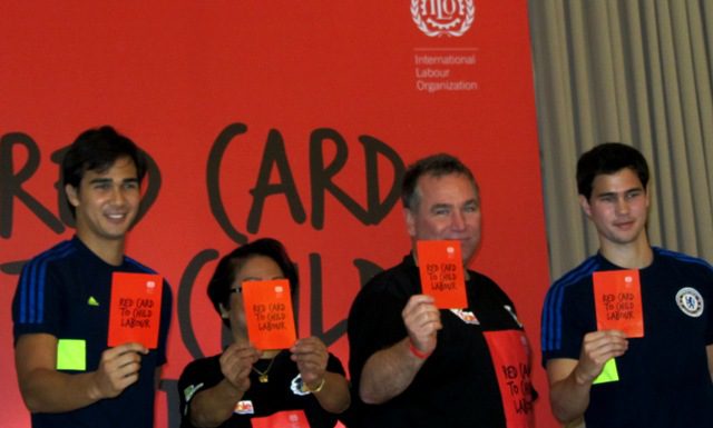 With footballers James and Phil Younghusband, Labor Sec. Rosalinda Baldoz and ILO Director Lawrence Jeff Johnson raise the red card vs child labor