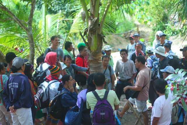 Gregorio Ratin (in light brown shirt) provides orientation to members of the international fact-finding mission at the Philex's mining area in Nagtalay, Negros Occidental in November 2012. (Photo by Ronalyn V. Olea / Bulatlat.com)