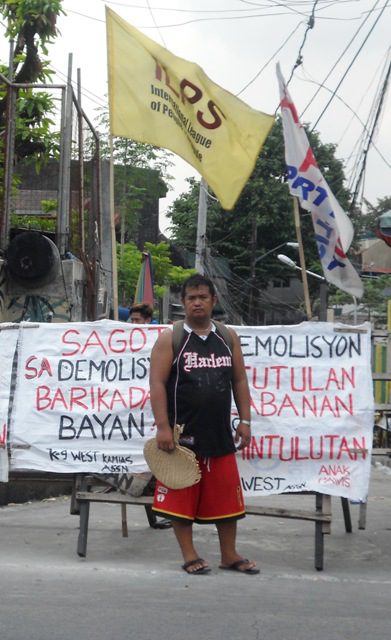 Dennis Mahinay, 36, has five children. He said finding a source of livelihood would be difficult if they are to be relocated in Montalban. He is driving a tricycle for a living. (Photo by A. Umil/ Bulatlat.com)