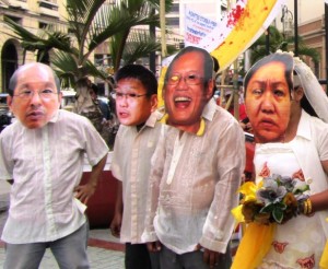 Bulatlat File Photo: June 12 protesters depict corruption of President Aquino, Budget Sec. Abad as intimately linked to corruption of so-called pork barrel queen Janet Lim-Napoles (Photo by M. Salamat / Bulatlat.com)