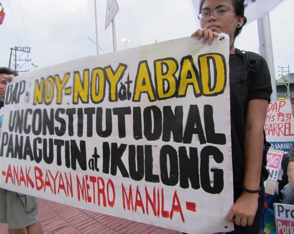 Members of Bayan-Metro Manila stage a noise barrage in Welcome Rotonda to reiterate long-time demand for total abolition of DAP, presidential pork, etc. (Photo by M. Salamat)