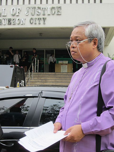 Bishop Reuel Norman Marigza, general secretary of the United Church of Christ in the Philippines (UCCP), demands justice for the slain UCCP members, Aug. 22. (Photo by Ronalyn V. Olea / Bulatlat.com)