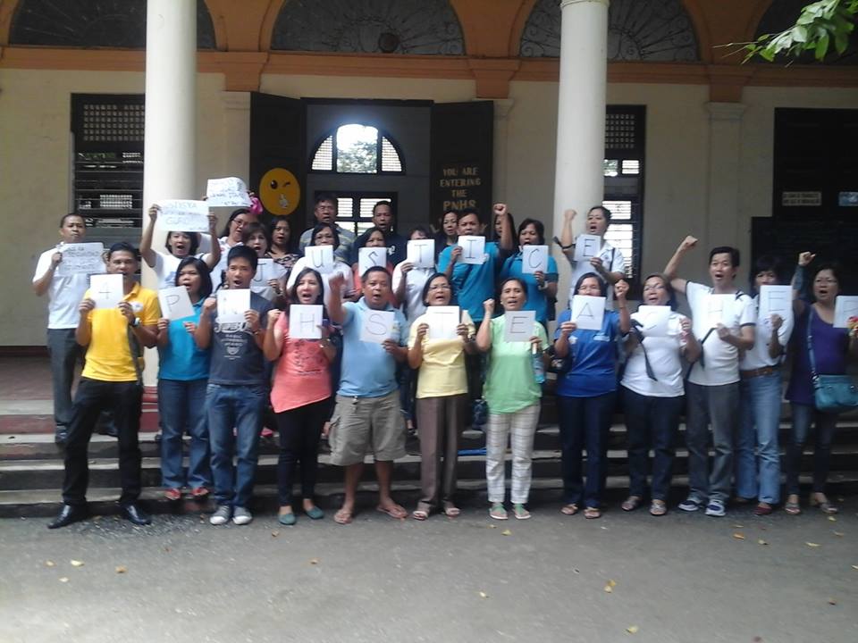 Teachers from Pangasinan National High School demand justice for their slain colleagues. (Photo from the Alliance of Concerned Teachers/ Bulatlat.com)