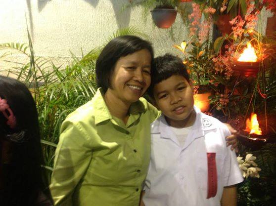 Fidela Salvador with son. (Photo from the Facebook account Quest for Justice for Engr. Delle Salvador/ Bulatlat.com)