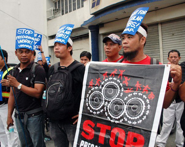 Members of Metal Workers Alliance of the Philippines mark World Day for Decent Work with a motorcade and picket in Laguna.