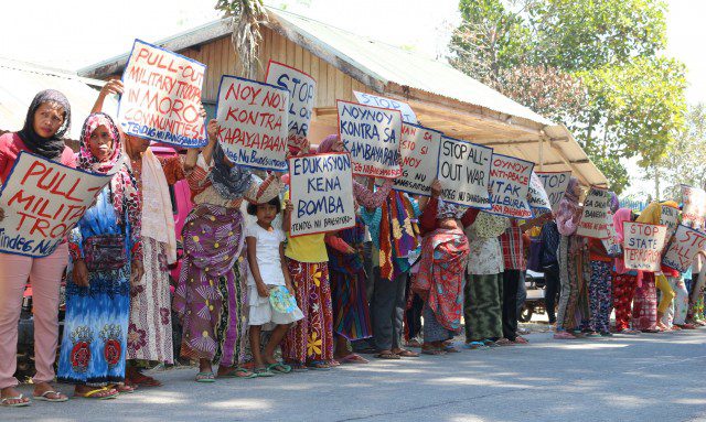 On the 47th year commemoration of the Jabidah Massacre, Moro evacuees in Elian village, Datu Saudi Ampatuan protest in front of the village hall to call for military pullout (Photo by Suara Bangsamoro)