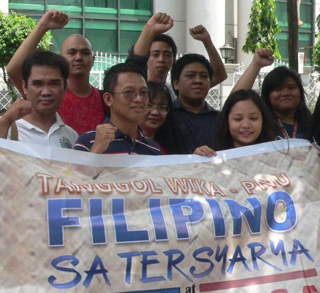 R to L: PNU students Francheska Santuico and Andrea Yasoña, UST Prof. Jonathan Geronimo, along with academicians, linguists and poets who went to the Supreme Court to petition CMO 20. (Photo by D. Ayroso/Bulatlat)