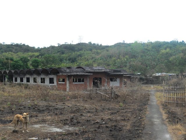 The abandoned poultry factory of Puyat Enterprise was made into houses by farmers living in San Isidro village, San Jose Del Monte City, Bulacan. (Photo by A. Umil/ Bulatlat.com)