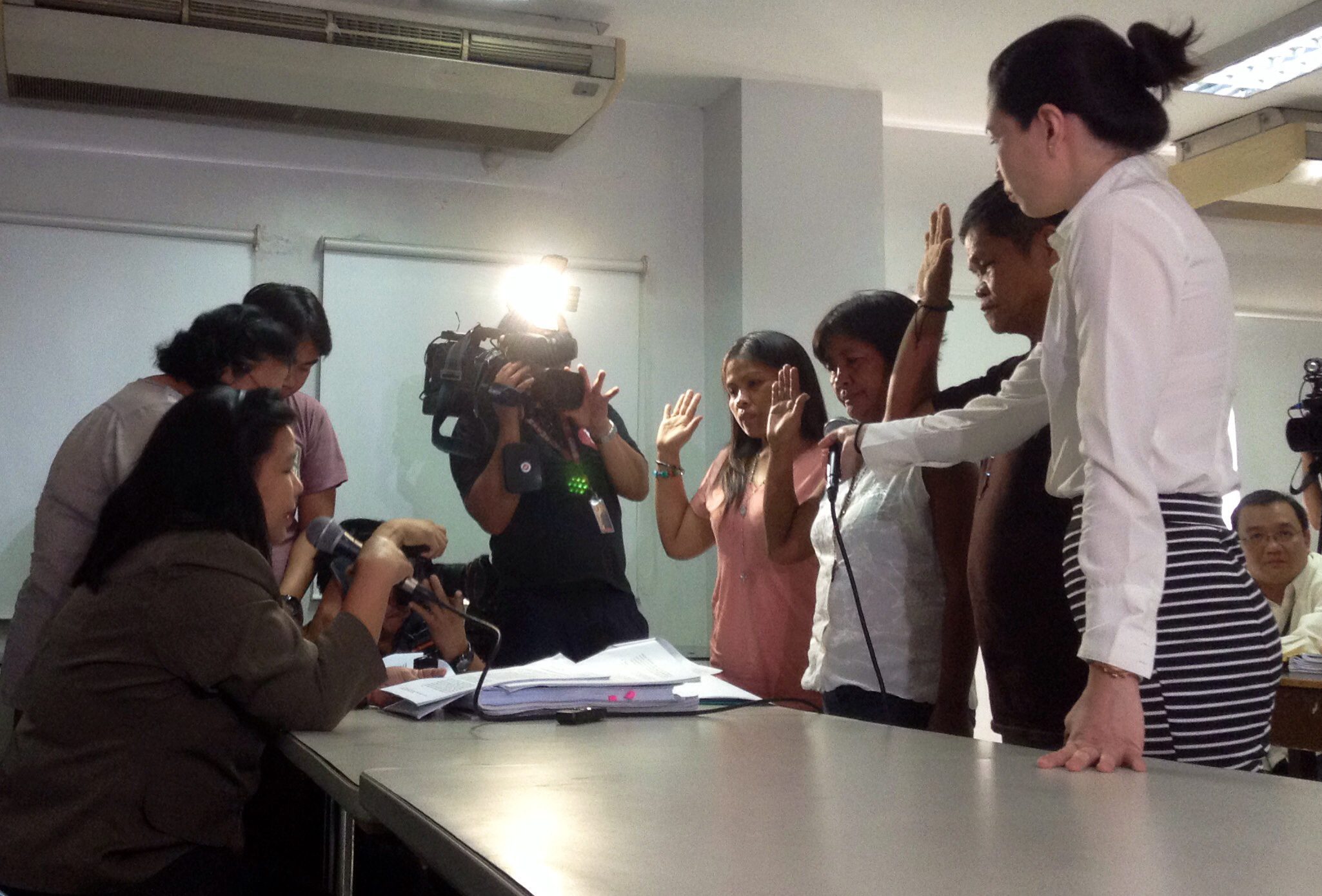 Veloso family submits their reply-complaint before DOJ prosecutor Azarcon. (Photo by J. Ellao / Bulatlat.com)