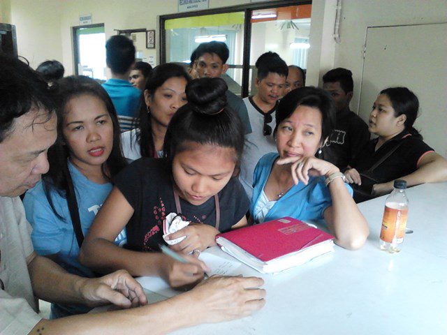 In the picture are relatives and survivors of Kentex factory fire set to file labor cases against Kentex Manufacturing Corp. and CJC manpower agency, May 26, 2015 (Photo by M. Salamat / Bulatlat.com)