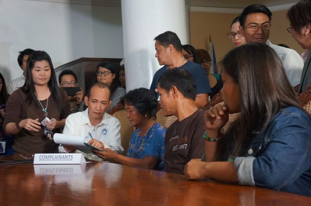 Veloso family and lawyer Edre Olalia (Photo by J. Ellao / Bulatlat.com)