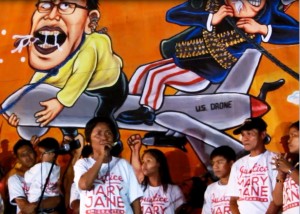 Veloso family led by Nanay Celia speak before May 1 protesters at Mendiola. (Photo grabbed from Bulatlat.com video)