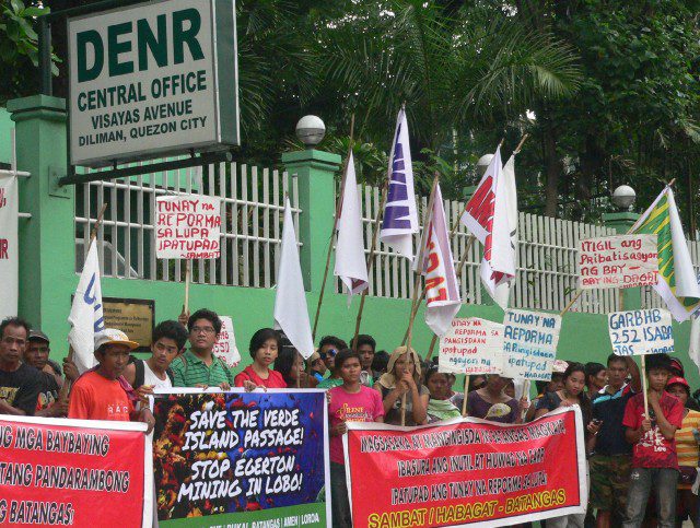 Green groups protest with Batangas peasant and fisherfolk outside DENR compound in Quezon City. (Photo by D. Ayroso)