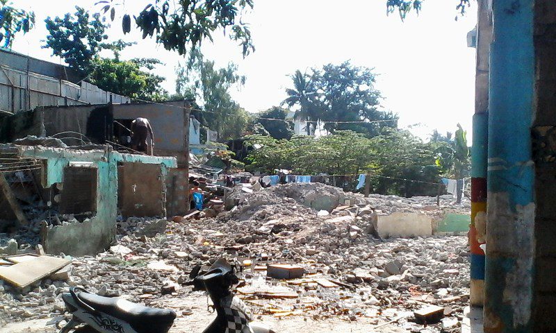 self-demolished homes by Tulllahan River