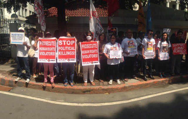 Protesters in front of the DOJ in Padre Faura, Manila (Photo by B.Catli/Bulatlat.com)