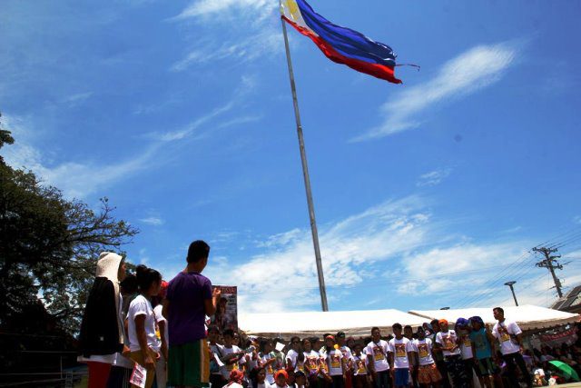 Alcadev students pay tribute to their school director Emerito Samarca at the Guingona Park, Butuan City.
