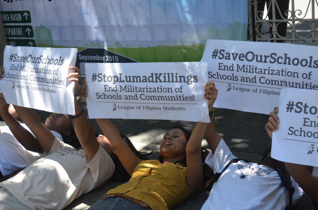 Youth protesters stage a 'die-in' in front of the DOJ in Manila (Photo by C.Cabanatan/Bulatlat.com