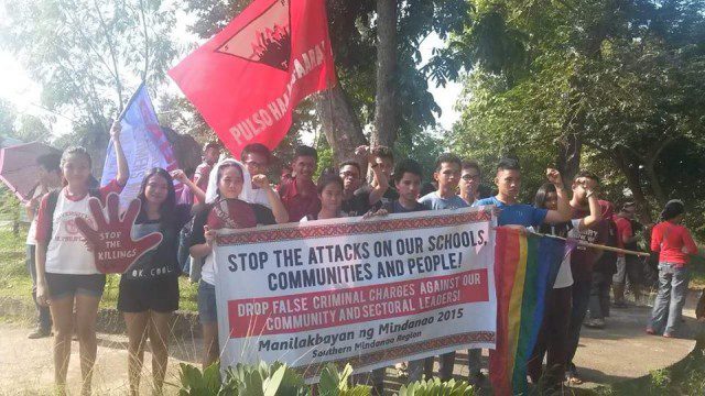Students of UP Tacloban raise fists in solidarity, as the Manilakbayan pass through Leyte (Photo by Kilab Multimedia)