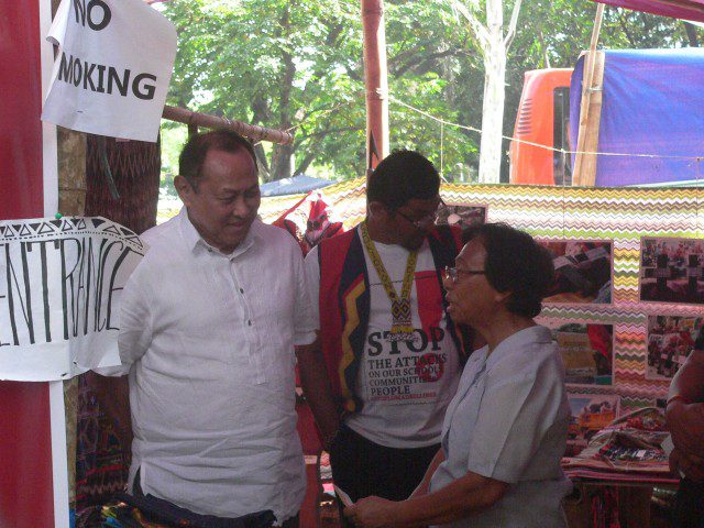 On Nov. 6, Postbank President Cesar Sarino, visits the Kampuhan, which is right across the PhilPost office . (Photo by D.Ayroso/Bulatlat.com)