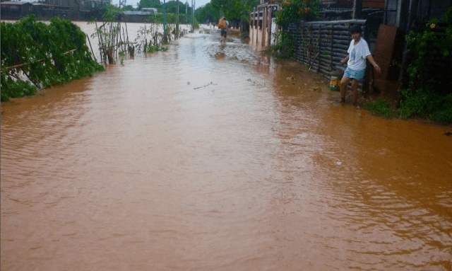 A ‘red sea’ of turbid flood waters submerged large parts of the municipality of Santa Cruz, Zambales during Typhoon Lando. Large-scale nickel mines have caused the massive siltation. Photo by Center for Environmental Concerns – Philippines