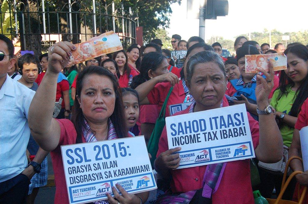 Public school teachers are not happy with the proposed Salary Standardization Law of 2015 saying that it is just an "alms." (Photo by Mon Ramirez) 