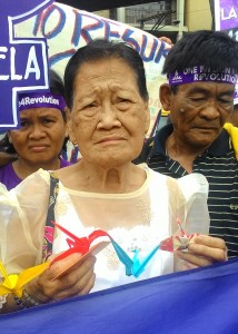 Estelita Dy, 85 also joined yesterday's protest. (Photo by A. Umil/ Bulatlat)