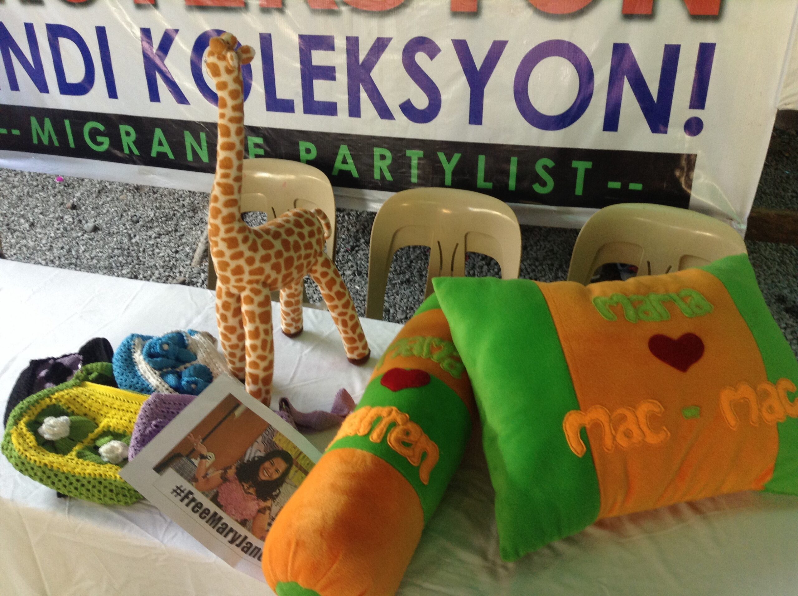 Pillows, crocheted bags and a stuffed toy made by Mary Jane. (Photo by J. Ellao / Bulatlat.com)
