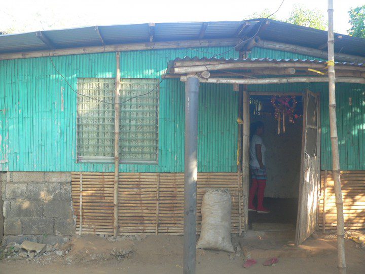 The Elauria house. Bamboo slats now cover the lower part of the wall where water and mud crashed through hollow blocks during Typhoon Lando. (Photo by D.Ayroso/Bulatlat)