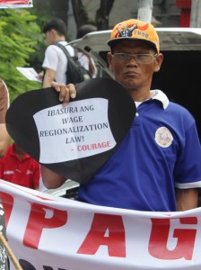 Rox Dela Cruz, 51, an employee of the National Food Authority for 33 years. (Photo by A.umil/ Bulatlat.com)