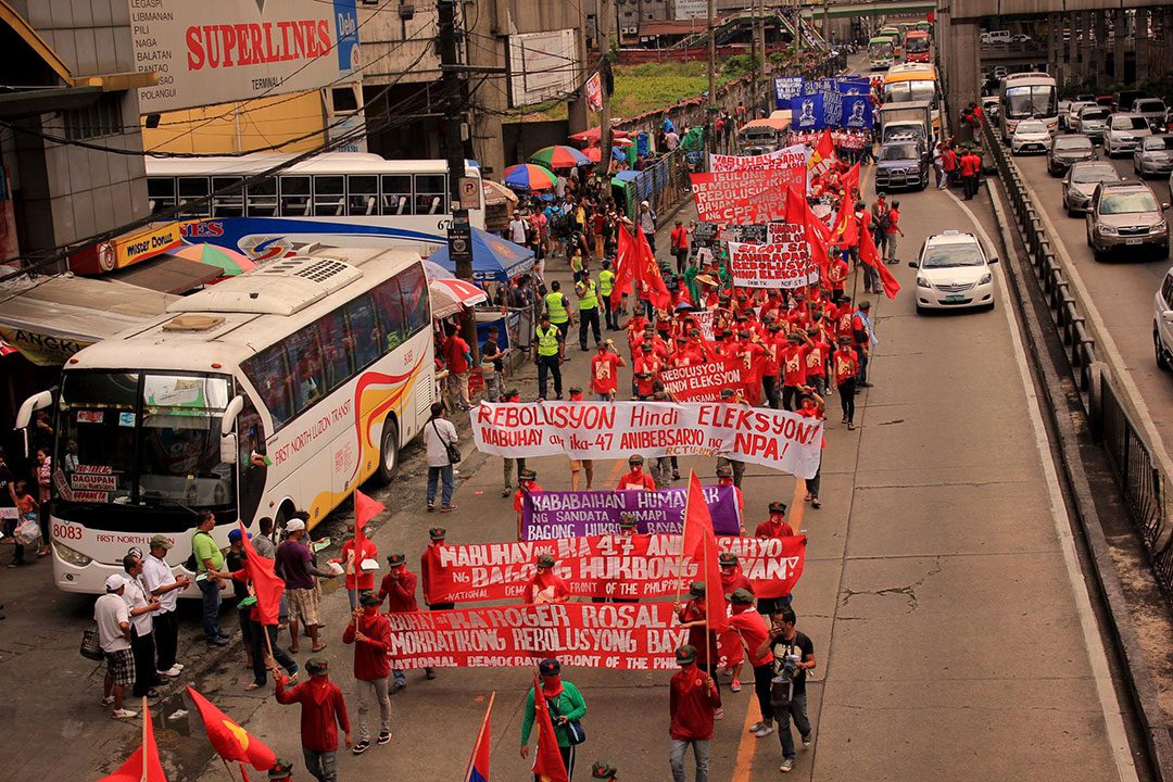 Thousands march from Cubao, Quezon City to University of the Philippines in Diliman in a public tribute to Gregorio "Ka Roger" Rosal, the late spokesperson of the Communist Party of the Philippines. (Photo by Southern Tagalog Exposure)
