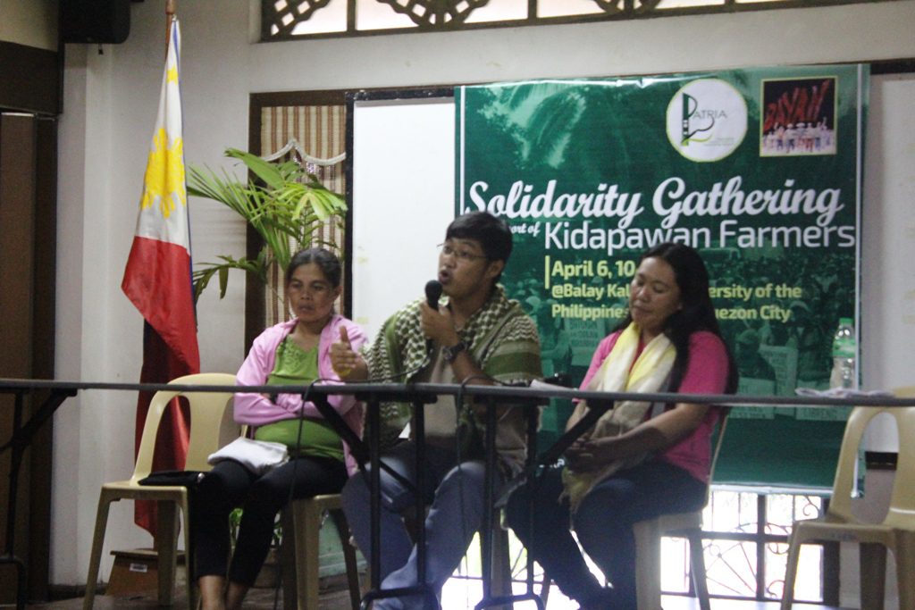 Jerome Aba (middle) while sharing his story during the solidarity gathering in UP-Diliman on April 6. (Photo by A. Umil/ Bulatlat)