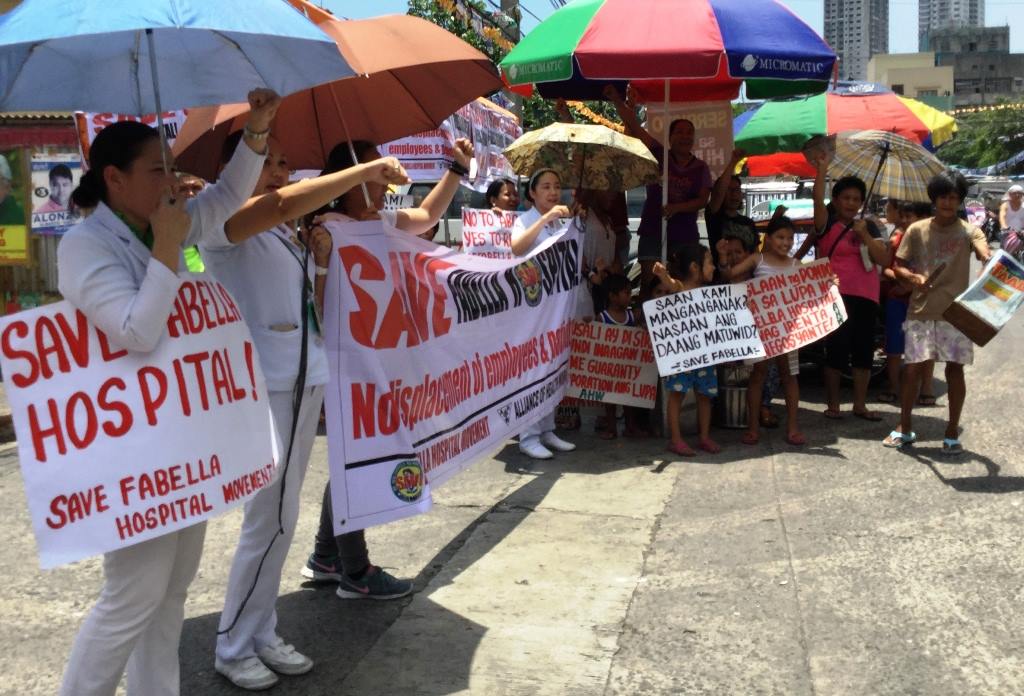 Members of the Alliance of Health Workers (AHW), Gabriela, employees, patients and members of the community held a picket in front of Fabella Hospital on May 3 to protest. (Photo by A. Umil.Bulatlat)