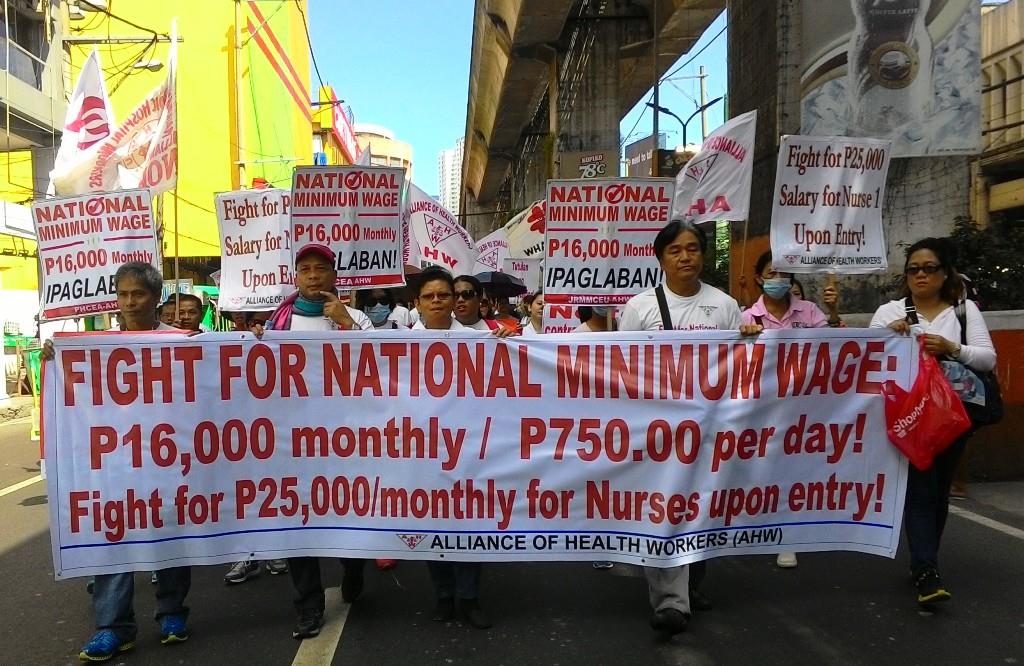 Hundreds of health workers marching towards Mendiola to once again amplify their long-time demand: P16,000 ($340) monthly minimum wage for government workers and P750 ($16) monthly increase for private employees. (Photo by A. Umil/ Bulatlat)
