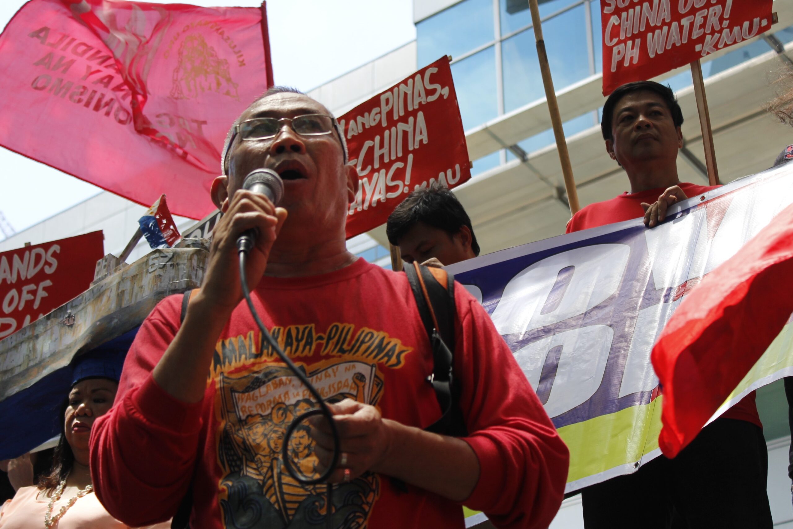 Pamalakaya vice chairperson Salvador France (foreground) at the protest in front of the Chinese Consulate in Makati City. (Photo by Karen Ann Macalalad/Bulatlat)