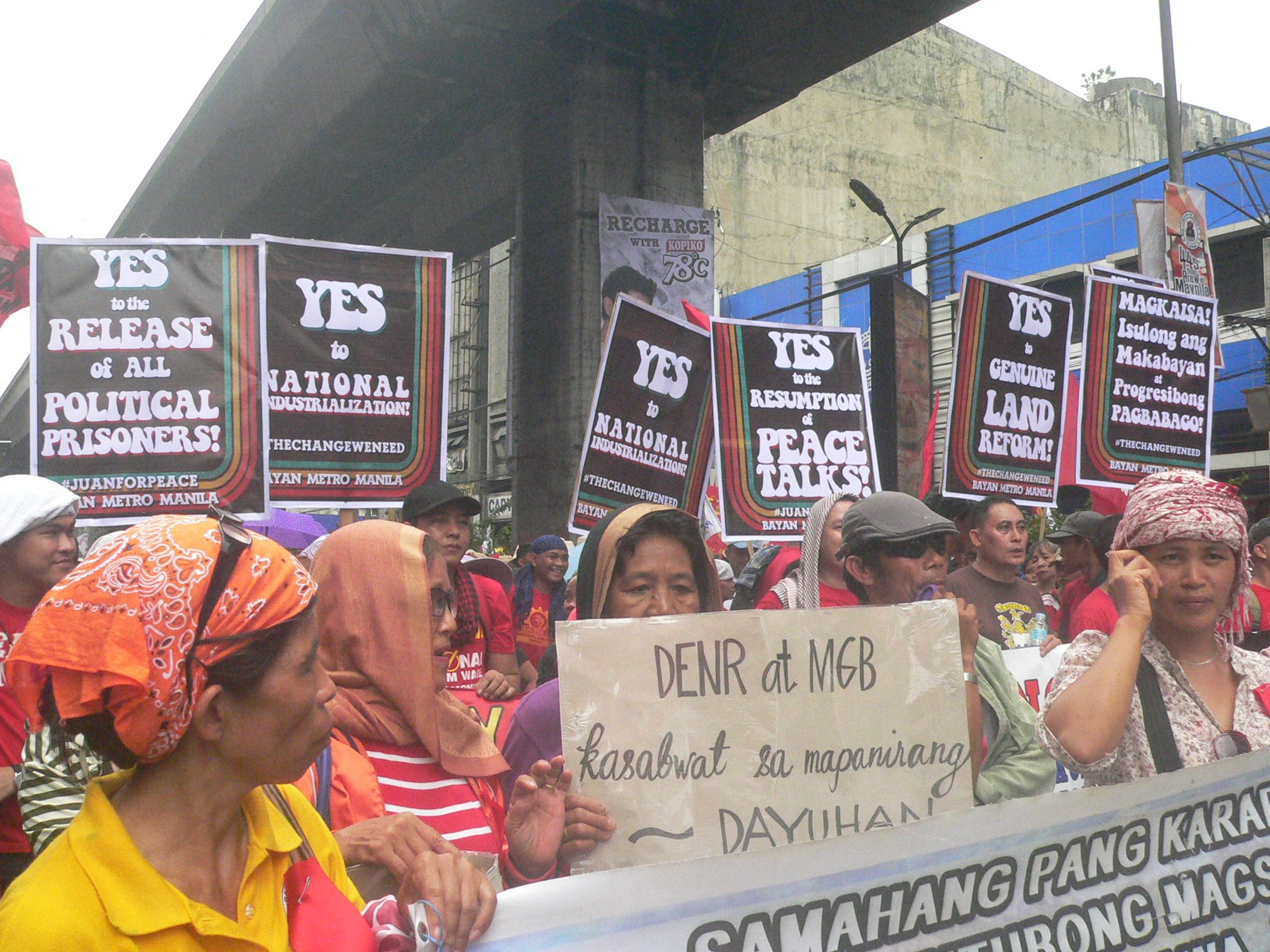 Members of Sapakmmi from Didipio, Kasibu, Nueva Vizcaya join the Mendiola rally on June 30 to call for a stop of OceanaGold's mining. (Photo by Dee Ayroso/Bulatlat)