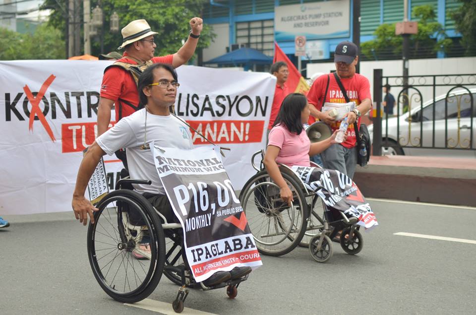 PWDs at the June 30 march for President Duterte's inauguration. (Photo by Carlo Manalansan/Bulatlat)