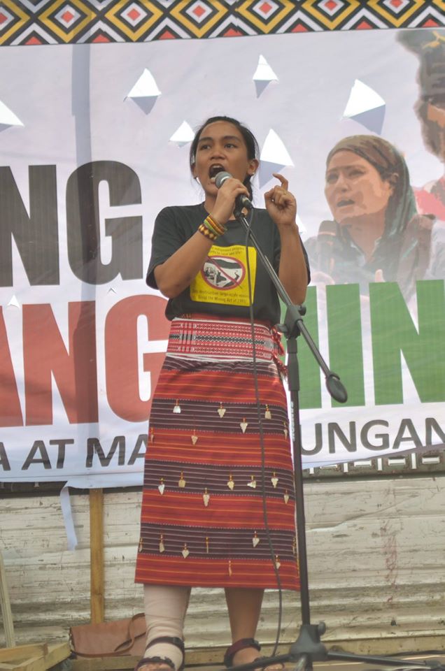 UNWAVERING. Piya Macliing Malayao at the Lakbayan closing rally in Mendiola Oct. 21. Her right leg is in a gutter cast after being run over by a police mobile run amok in the Oct. 19 US embassy dispersal. (Photo by Carlo Manalansan/Bulatlat)