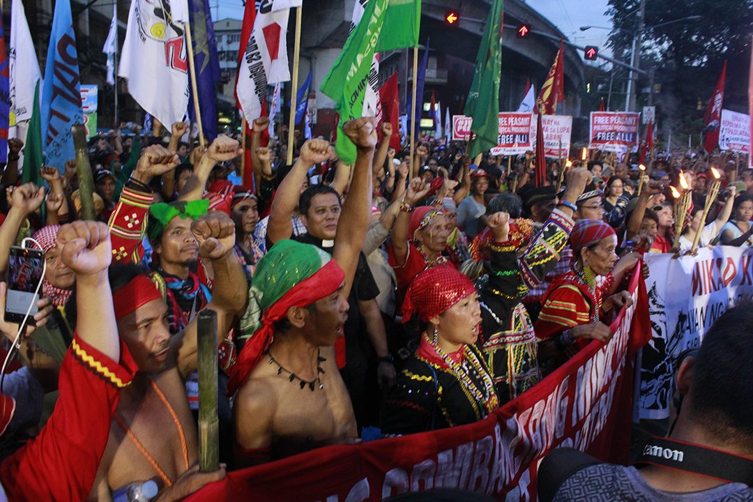 National minorities cry out for self determination in the streets of Manila, Philippines. (Photo by Ken Bautista/IPMSDL)