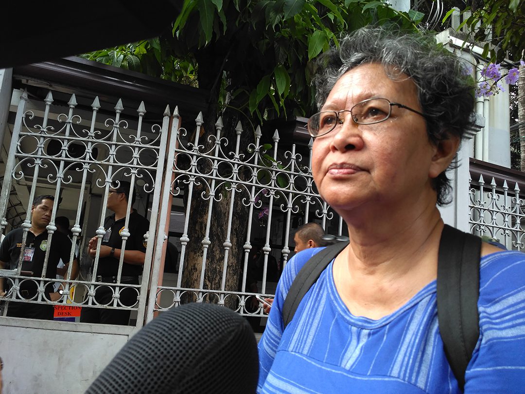Eyes red from tears, SELDA chairperson Marie Hilao-Enriquez says she is angry and disappointed with the Supreme Court decision allowing Ferdinand Marcos to be buried at the Libingan ng mga Bayani. (Photo by Ronalyn V. Olea/ Bulatlat)