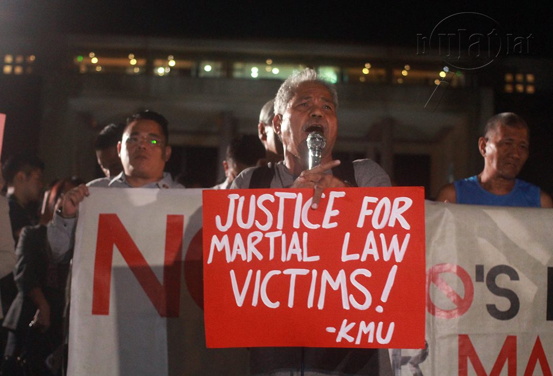 Roger Soluta of Kilusang Mayo Uno quips, "Ang siyam na bumoto, isama sa paglibing kay Marcos." (Photo by Gino Estella / Bulatlat)