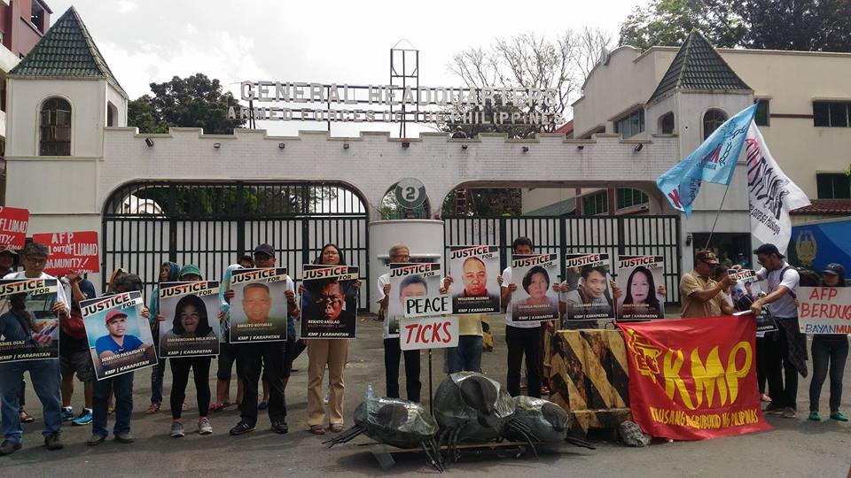 Peasant and human rights groups protest at the gates of the AFP headquarters in Camp Aguinaldo on March 10 (Photo courtesy of Kathy Yamzon)