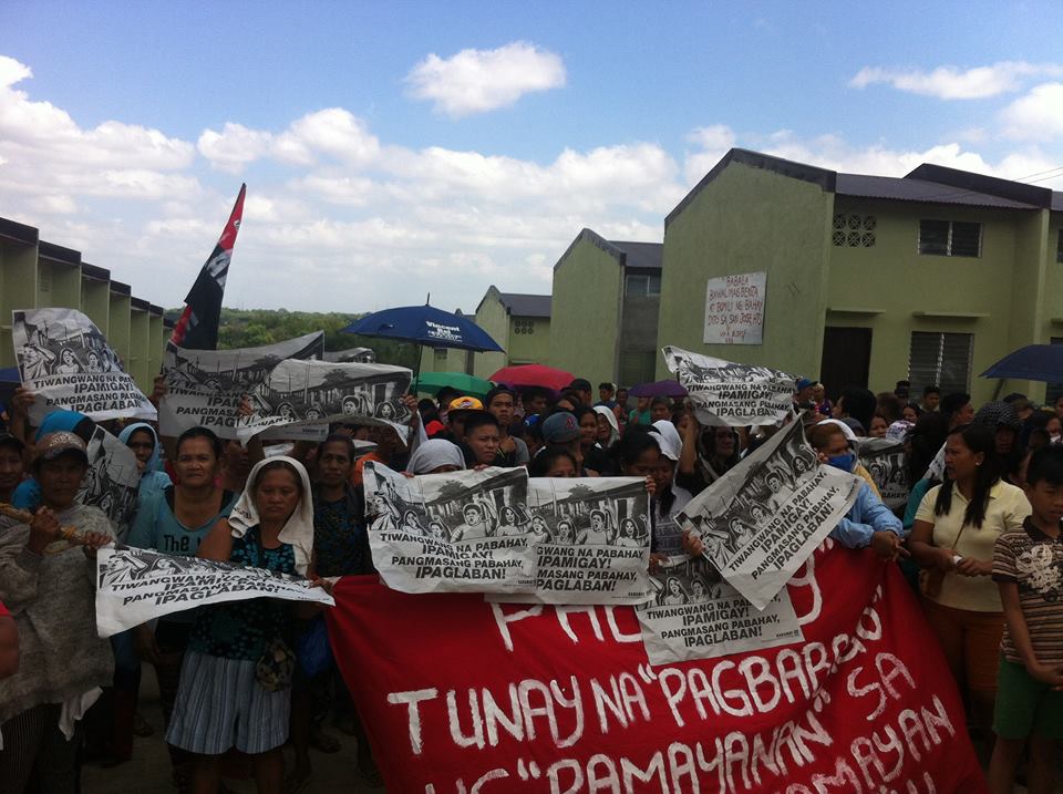 On March 8, urban poor groups mostly led by Kadamay occupied a total of 5,208 idle housing units in five relocation sites in Pandi, Bulacan. (Photo grabbed from Kadamay's Facebook page)