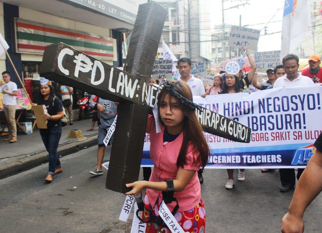 Public school teachers' depiction of the CPD Law. (Photo by A. Umil/Bulatlat)
