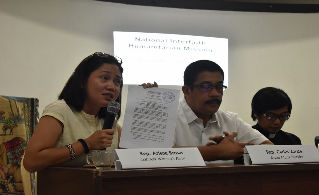 L-R: Gabriela Women's Partylist Rep. Arlene Brosas, Bayan Muna Rep.  Carlos Zarate, Rev.  Irma Balaba (Photo by Ian Irving Bazarte/Bulatlat)